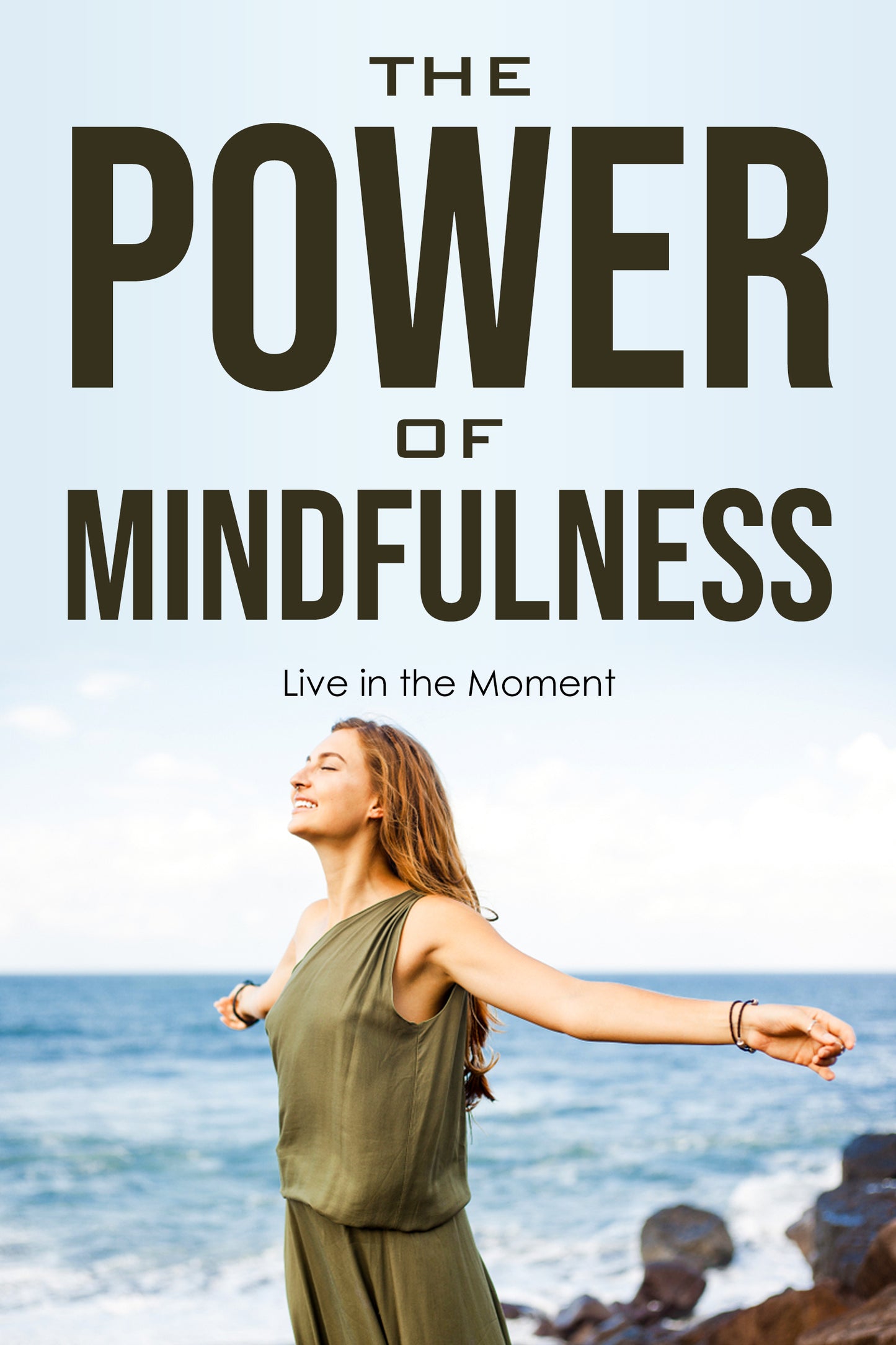 Woman standing by the ocean with 'The Power of Mindfulness' text overlay