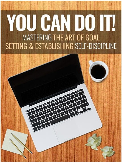 Laptop, coffee cup, and notes on a wooden surface with motivational text about goal setting and self-discipline.